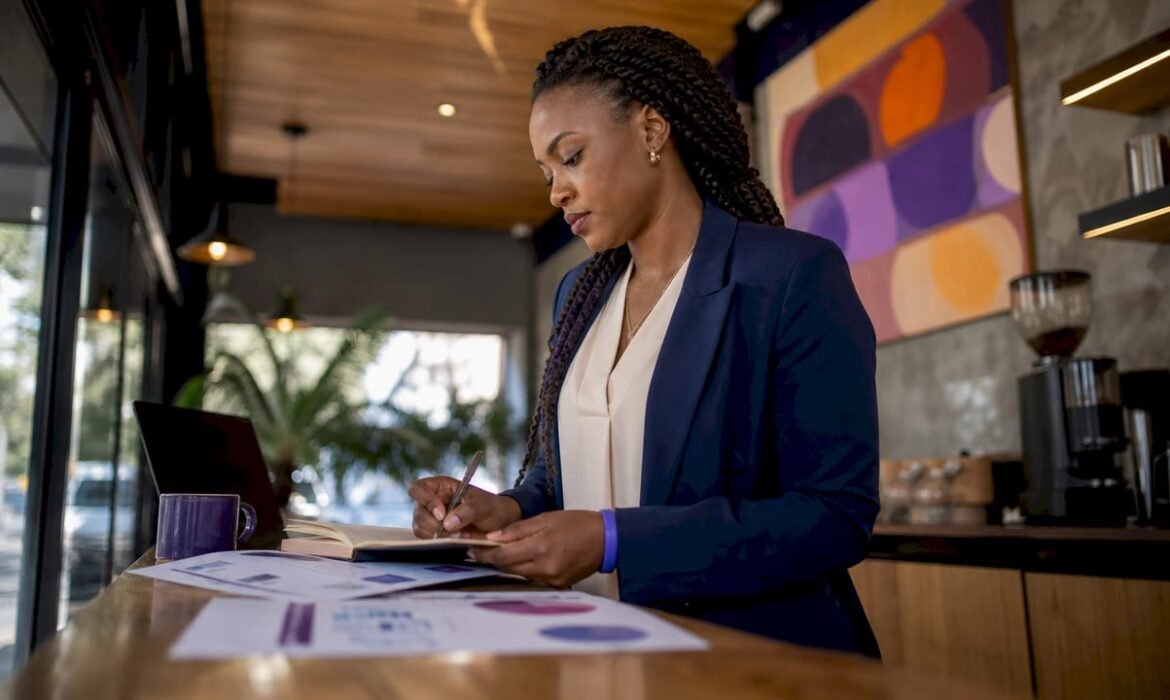 Businesswoman reviewing marketing alignment documents
