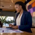 Businesswoman reviewing marketing alignment documents